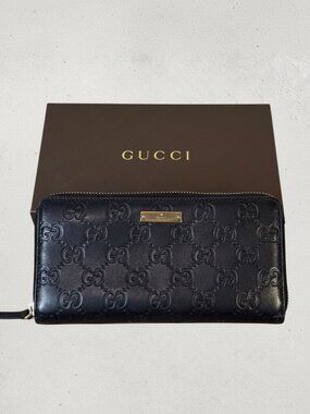 GUCCI Guccissima Leather Zip-Around Wallet. P0087